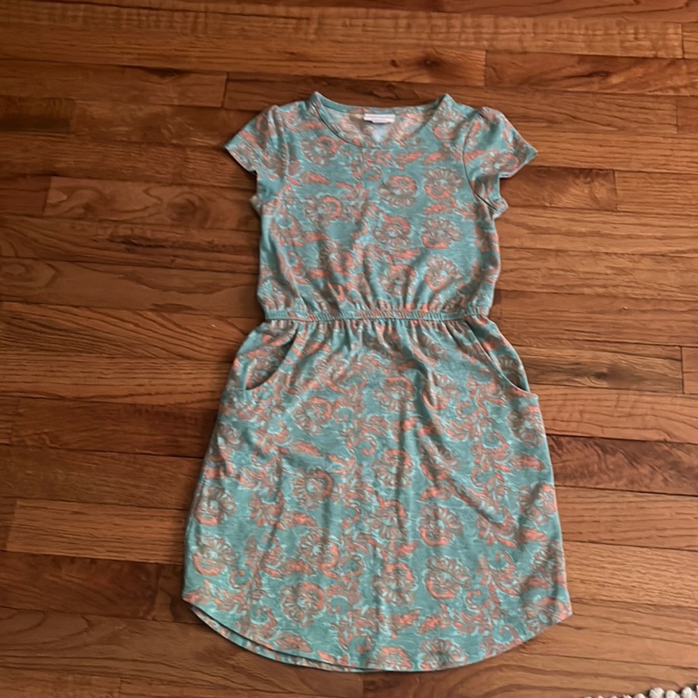 A green and orange dress!